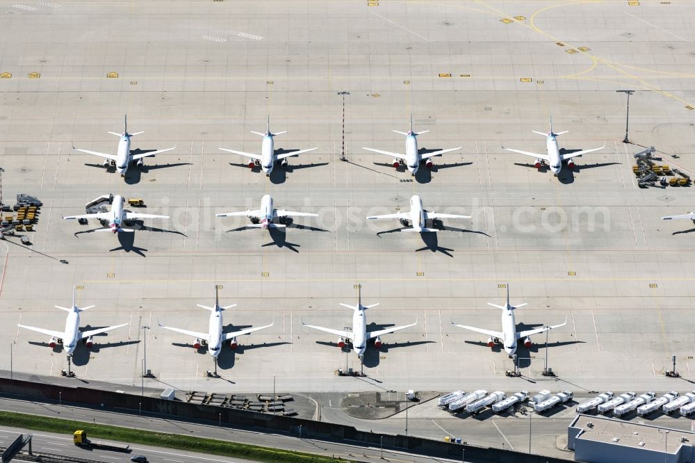 Aerial image Stuttgart - Passenger aircraft parked due to the crisis and pandemic on the parking position - parking area at the airport in Stuttgart during the corona lockdown in the state Baden-Wuerttemberg, Germany
