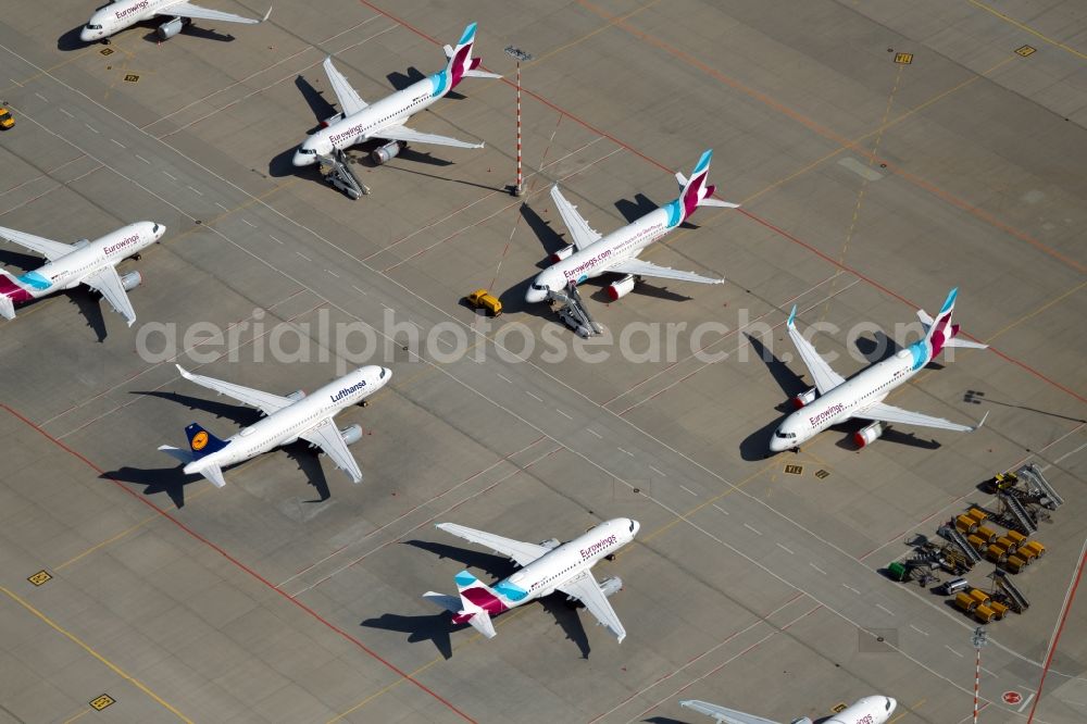 Aerial image Stuttgart - Passenger aircraft parked due to the crisis and pandemic on the parking position - parking area at the airport in Stuttgart during the corona lockdown in the state Baden-Wuerttemberg, Germany