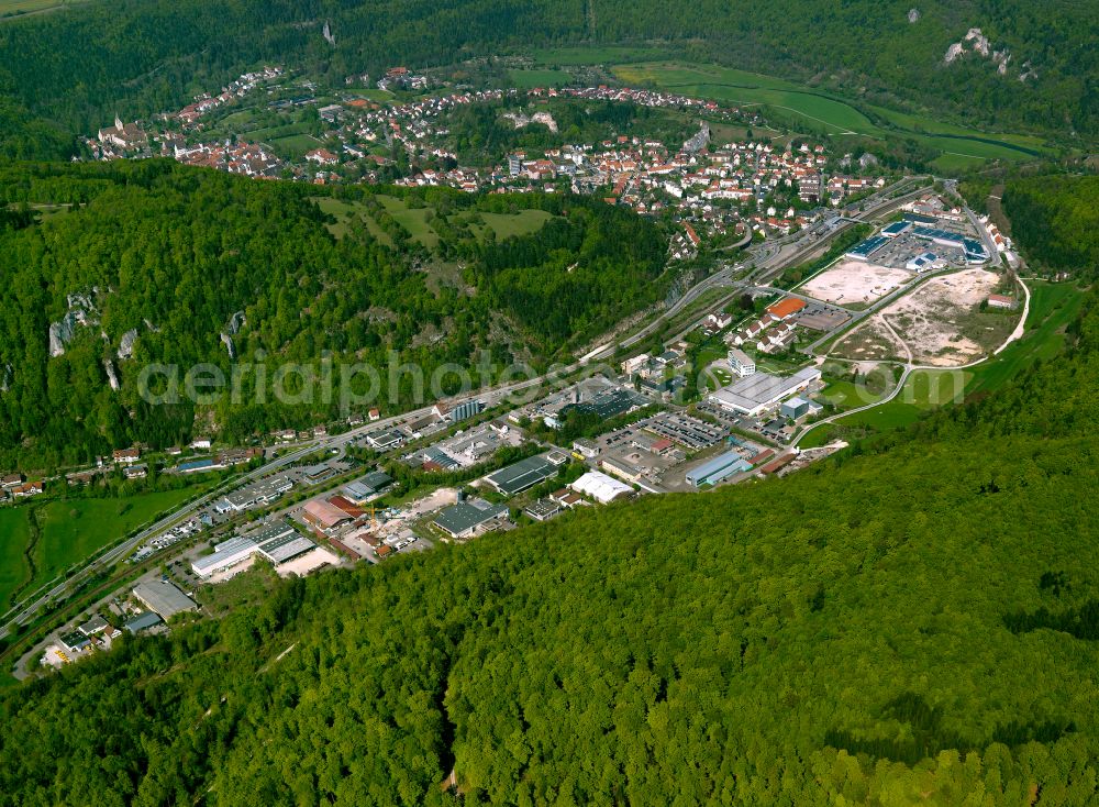 Aerial photograph Weiler - Industrial and commercial area in the middle of a wooded area in Weiler in the state Baden-Wuerttemberg, Germany