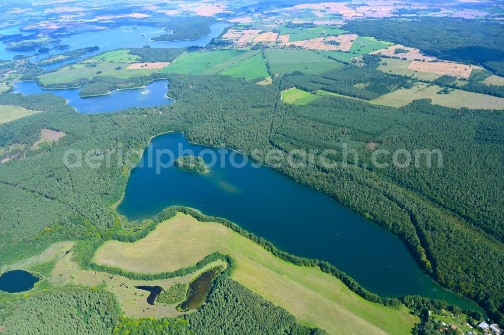 Krüselin from the bird's eye view: Forests on the shores of Lake Krueselinsee in Krueselin Boitzenburger Land in the state Mecklenburg - Western Pomerania, Germany