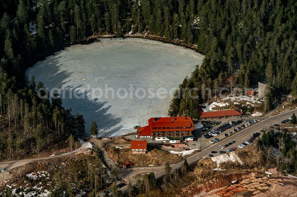 Seebach from above - Forests on the shores of Lake Mumelsee with Berghotel Mummelsee33 in Seebach in the state Baden-Wurttemberg, Germany