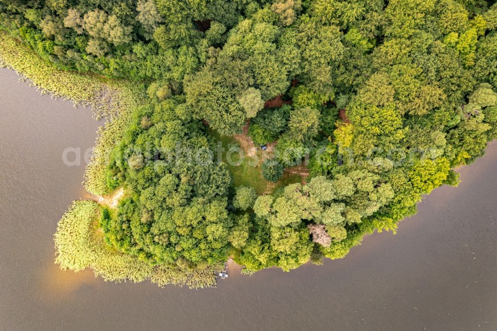 Aerial image Althüttendorf - Forests on the shores of Lake Tiefer Bugsinsee in Althuettendorf in the state Brandenburg, Germany