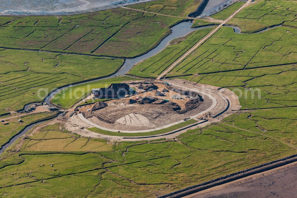 Nordstrand from the bird's eye view: Terp and Warft construction site for flood protection in Hallig Nordstrandischmoor in the state Schleswig-Holstein, Germany