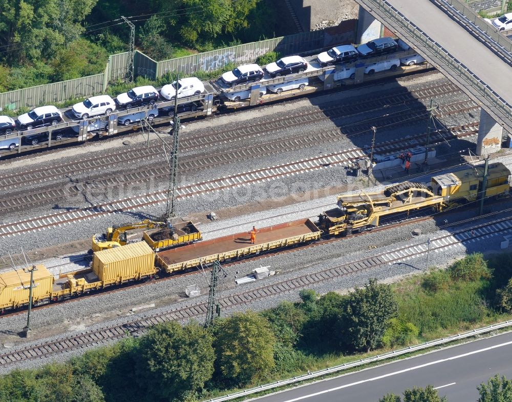 Aerial photograph Bovenden - Maintenance work on a rail track and overhead wiring harness in the route network of the Deutsche Bahn in the district Harste in Bovenden in the state Lower Saxony, Germany