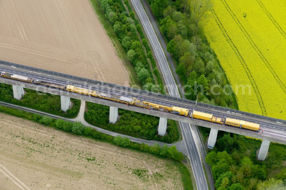 Rosdorf from above - Maintenance work on a rail track and overhead wiring harness in the route network of the Deutsche Bahn in Rosdorf in the state Lower Saxony, Germany