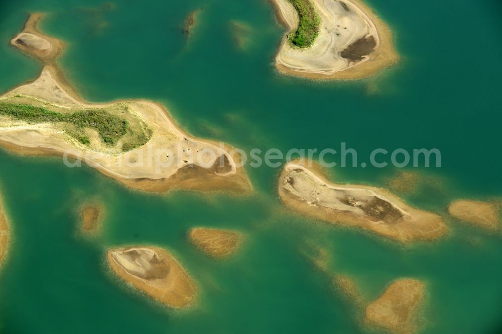 Laußig from above - Water landscape on gravel surface mining the gravel pit of Xella Deutschland GmbH in Laussig in Saxony