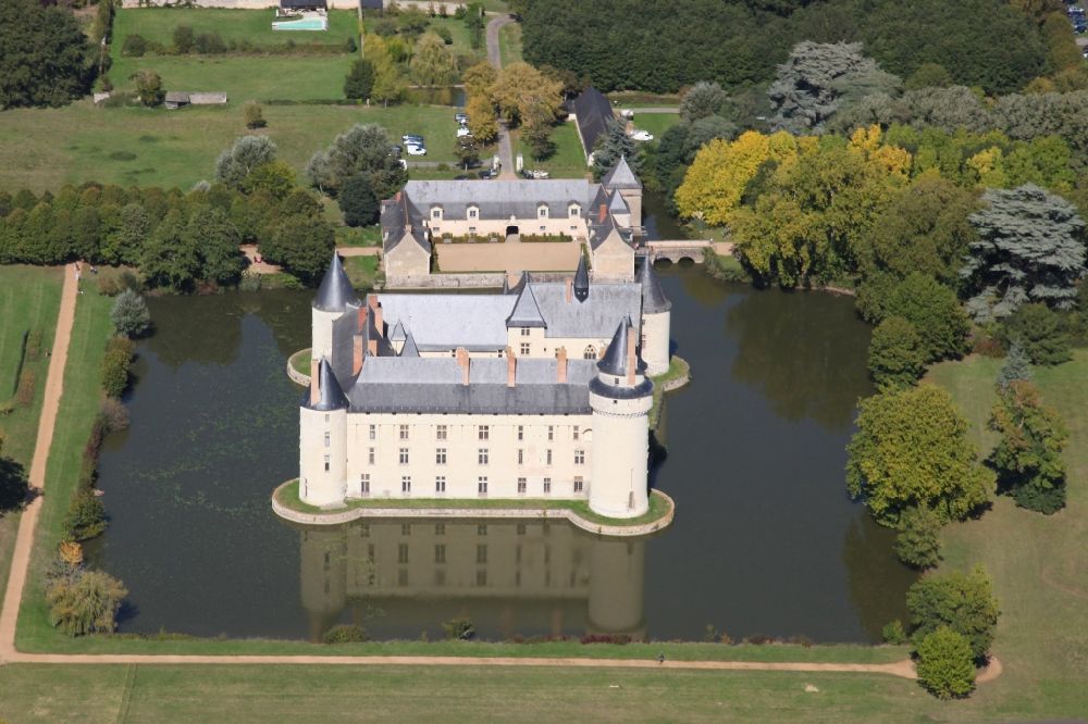 Ecuille from above - Building and castle park systems of water castle Chateau du Plessis bourre in Ecuille in Pays de la Loire, France. The feudal dwelling was completed within five years in the outgoing Middle Ages and presents itself virtually unchanged to the visitor of today. The builder was Jean Bourre