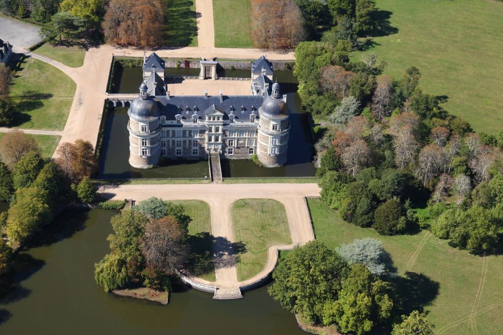 Aerial image Saint-Georges-sur-Loire - Building and castle park systems of water castle Chateau de Serrant in Saint-Georges-sur-Loire in Pays de la Loire, France. An important and symbolic work of renaissance architecture