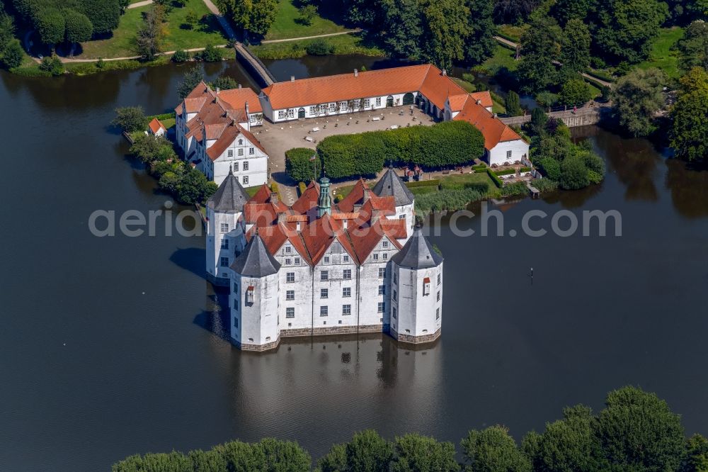 Aerial image Glücksburg - Building and castle park systems of water castle in Gluecksburg (Ostsee) in the state Schleswig-Holstein