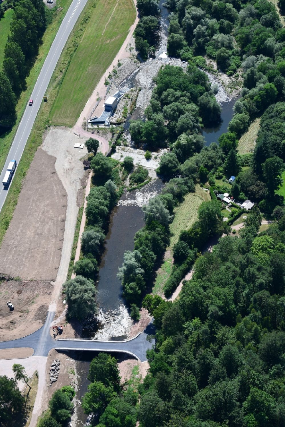 Maulburg from the bird's eye view: Structure and dams of the hydroelectric power plant and new Bridge across the river Wiese in Maulburg in the state Baden-Wurttemberg, Germany