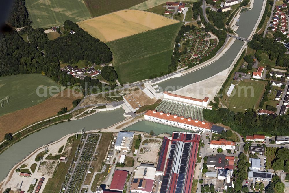 Töging am Inn from the bird's eye view: Building and dams of the waterworks and hydroelectric power plant in Toeging am Innkanal in the state of Bavaria, Germany
