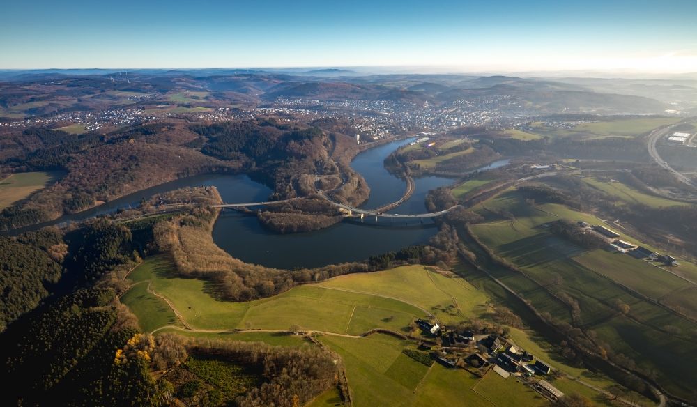 Olpe from above - Low water level and lack of water caused the shoreline areas to be exposed of Biggesee in Olpe in the state North Rhine-Westphalia, Germany