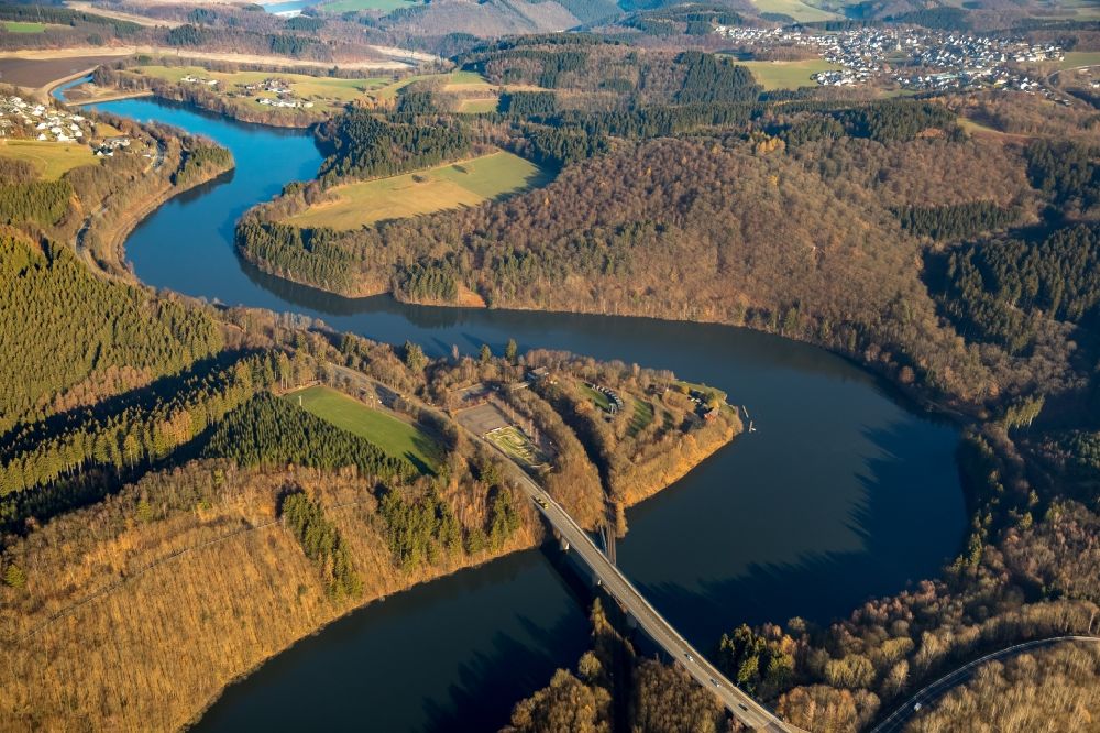 Aerial photograph Olpe - Low water level and lack of water caused the shoreline areas to be exposed of Biggesee in Olpe in the state North Rhine-Westphalia, Germany