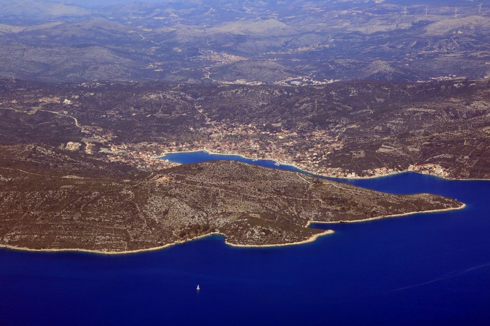 Vinisce from above - Water surface at the bay along the sea coast Adriatic Sea in Vinisce in Splitsko-dalmatinska zupanija, Croatia