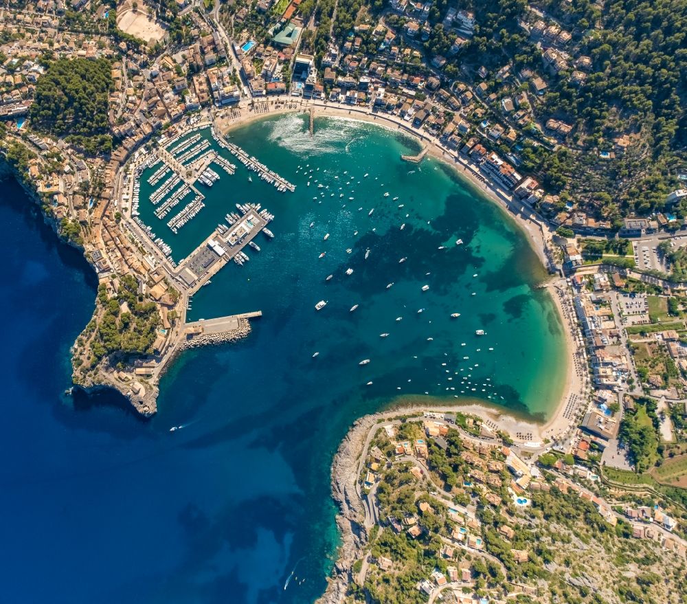 Port de Soller from above - Water surface at the bay along the sea coast of Balearic Sea in Port de Soller in Balearic Islands, Spain
