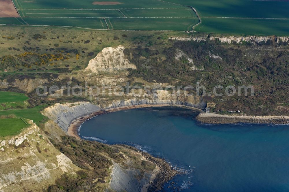 Aerial photograph Worth Matravers - Water surface at the bay along the sea coast of English Channel Chapman's Pool in Worth Matravers in England, United Kingdom