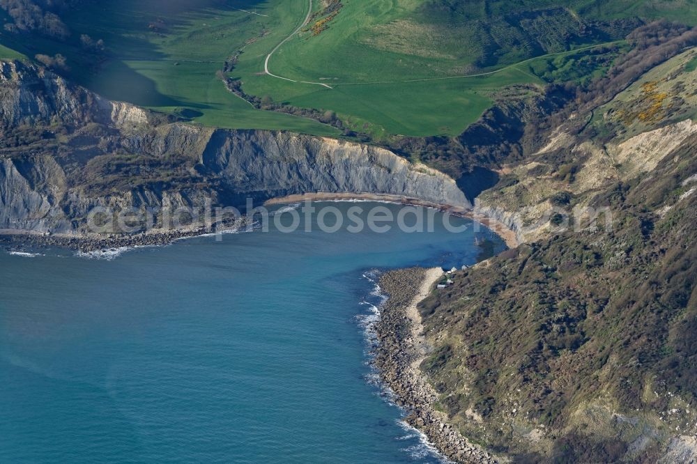 Aerial photograph Worth Matravers - Water surface at the bay along the sea coast of English Channel Chapman's Pool in Worth Matravers in England, United Kingdom