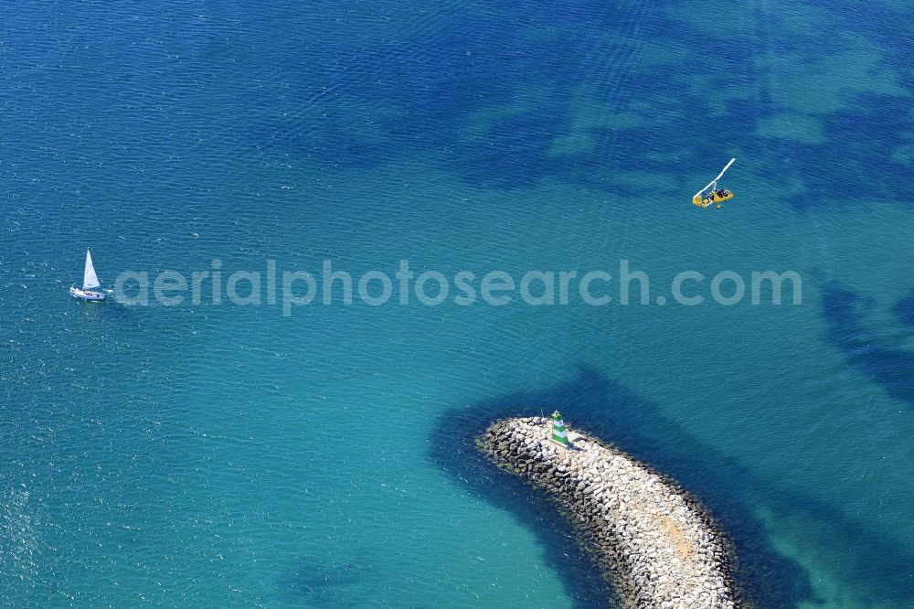 Lagos from above - Water surface at the seaside mole of in Lagos in Distrikt Faro, Portugal