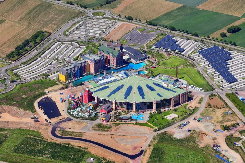 Aerial photograph Rust - New building and area Wasserpark in the Europa-Park Camp Resort with empty car parks during Corona lockdown in Rust in the state Baden-Wurttemberg