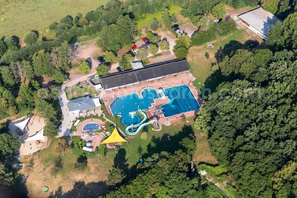 Aerial image Kandel - Waterslide on Swimming pool of the Waldschwimmbad Kandel in Kandel in the state Rhineland-Palatinate, Germany