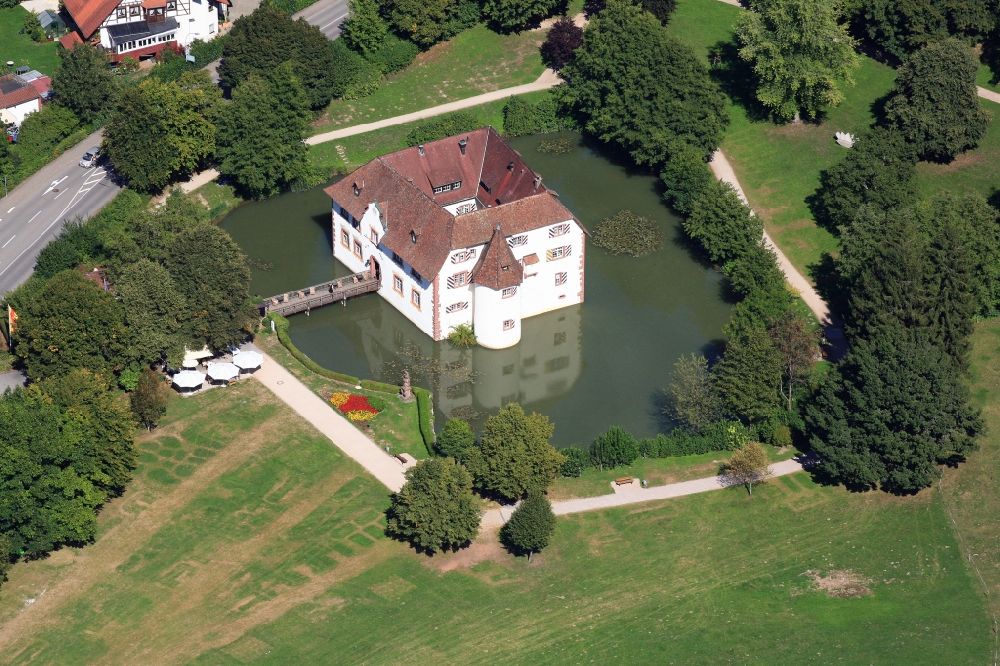 Inzlingen from above - The moated castle Inzlingen in Baden-Wuerttemberg. The moated castle is home for the town hall, a restaurant, meeting rooms and a ballroom