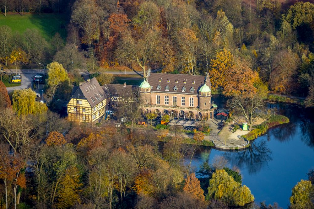 Aerial image Gladbeck - Autumnal vegetation view of moated castle Schloss Wittringen with castle park and ponds in Gladbeck in the Ruhr area in the state of North Rhine-Westphalia - NRW, Germany