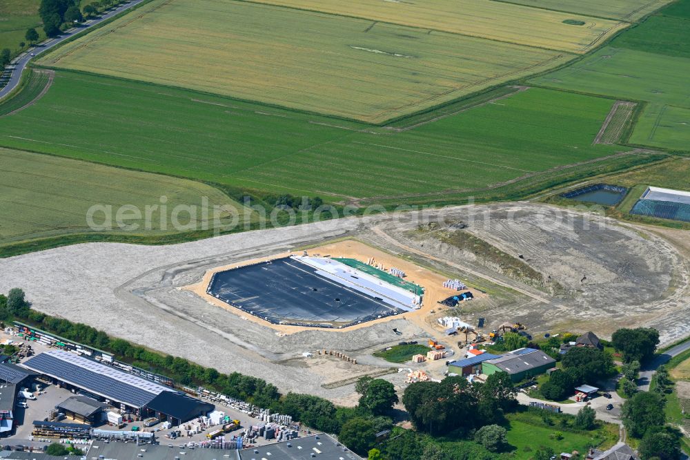 Aerial photograph Meldorf - Construction site for the new construction of the waterworks - underground storage facility as Germany's first underground storage tank on the street Kirchweg in Meldorf in the state Schleswig-Holstein, Germany