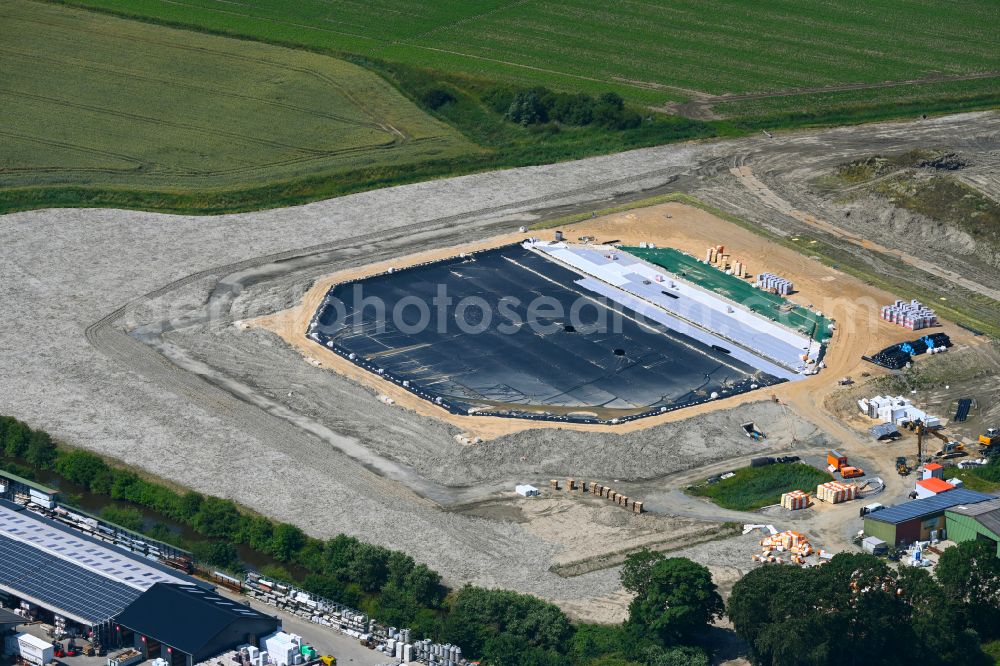 Meldorf from above - Construction site for the new construction of the waterworks - underground storage facility as Germany's first underground storage tank on the street Kirchweg in Meldorf in the state Schleswig-Holstein, Germany