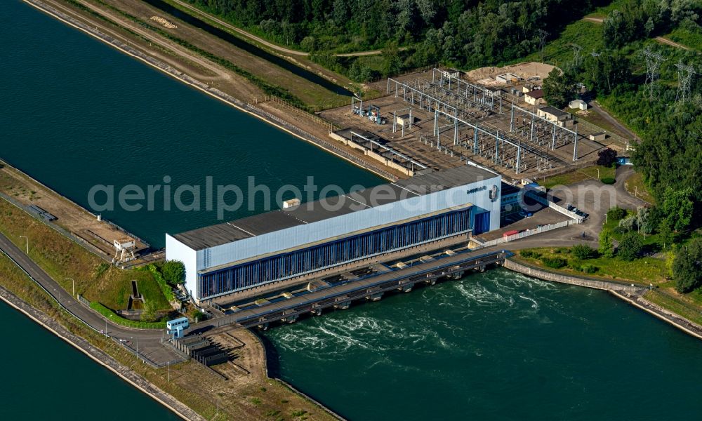 Rhinau from above - Structure and dams of the waterworks and hydroelectric power plant Rhinau Hydroelectric Plant on rhine river in Assens in Grand Est, France