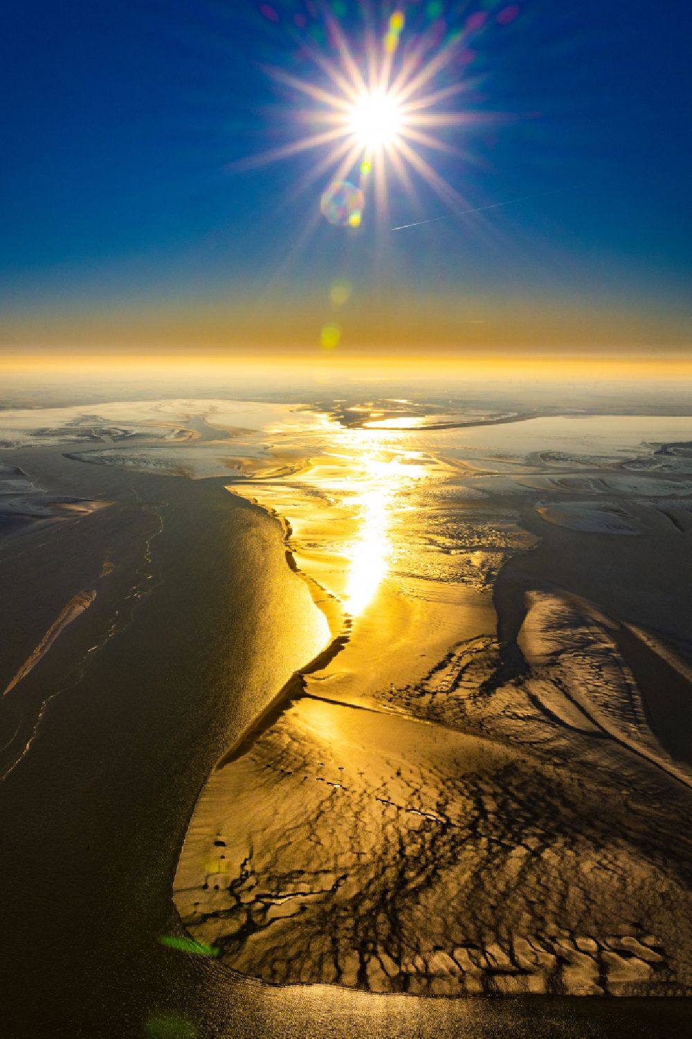 Aerial photograph Krummhörn - Wadden Sea in Krummhoern in the sunset in the state Lower Saxony, Germany