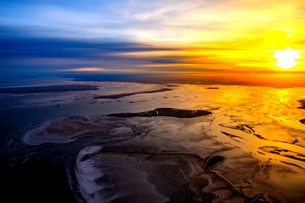 Hooge from the bird's eye view: Wadden Sea of the North Sea coast in Hallig Hooge at sunrise in the state Schleswig-Holstein, Germany