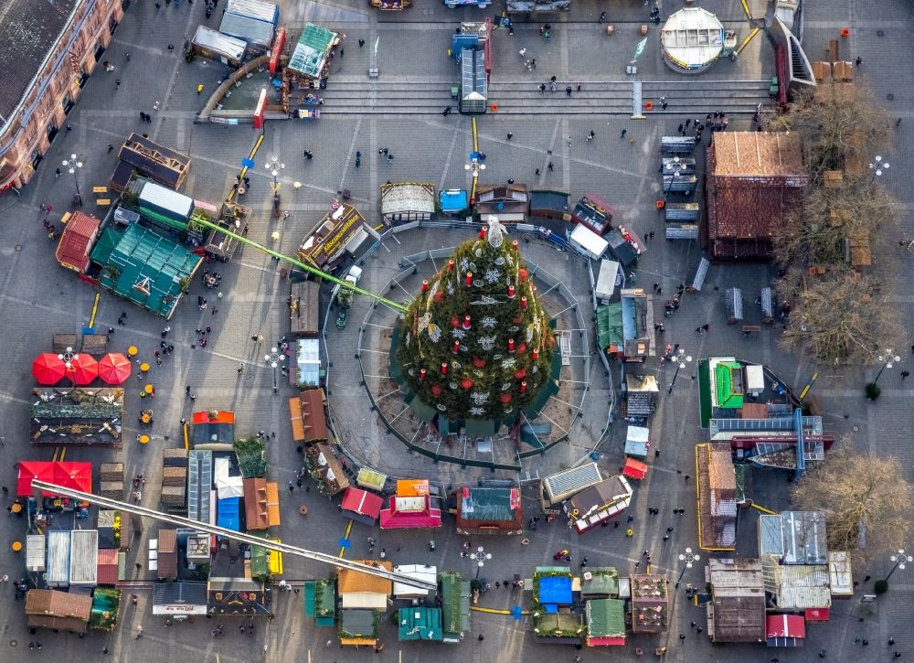 Dortmund from the bird's eye view: Christmassy market event grounds and sale huts and booths on Friedensplatz in the district City-Ost in Dortmund at Ruhrgebiet in the state North Rhine-Westphalia, Germany