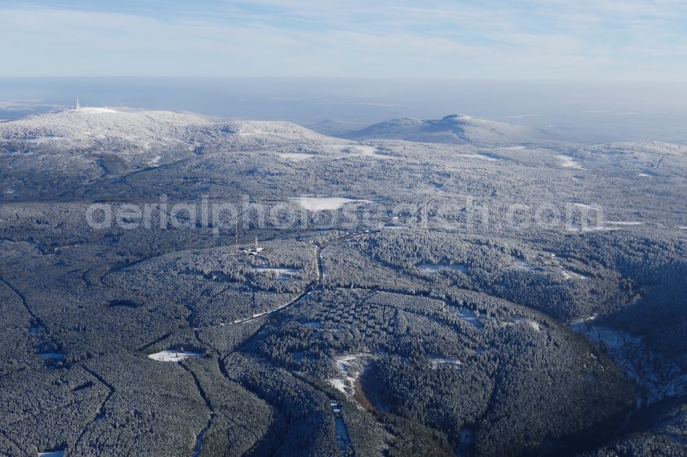 Herzberg am Harz from above - White and snowy peaks des Harzes in the rocky and mountainous landscape in Herzberg am Harz in the state Lower Saxony