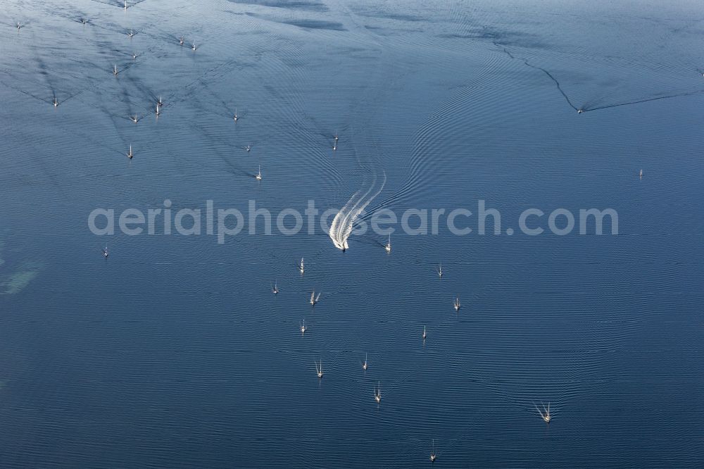 Aeroe from above - Wave structures on the sea surface caused by boats on the Baltic Sea in Syddanmark, Denmark
