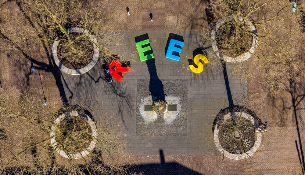 Aerial image Rees - Promotion and advertising lettering - REES lettering on the street Markt in Rees in the state of North Rhine-Westphalia, Germany