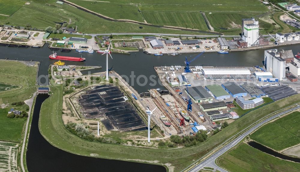 Husum from the bird's eye view: Shipyard - site of the Husumer Dock und Reparatur in the district Roedemis in Husum in the state Schleswig-Holstein