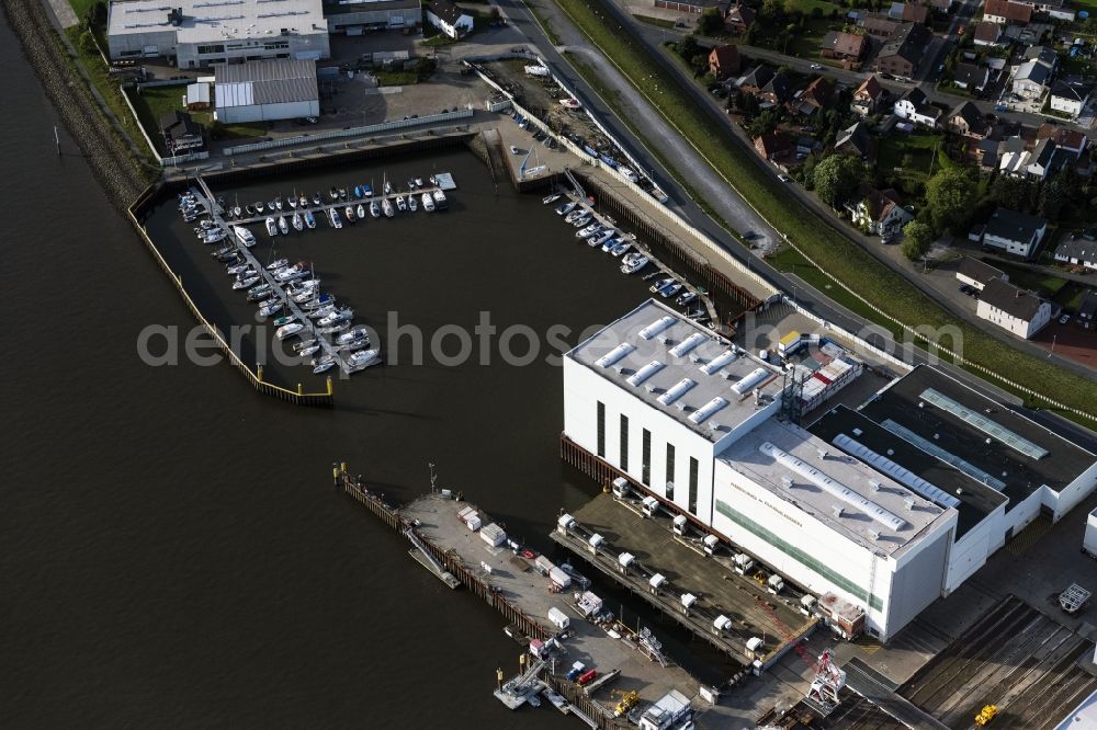 Lemwerder from the bird's eye view: Shipyard on the banks of the Weser river in Lemwerder in the state Lower Saxony, Germany
