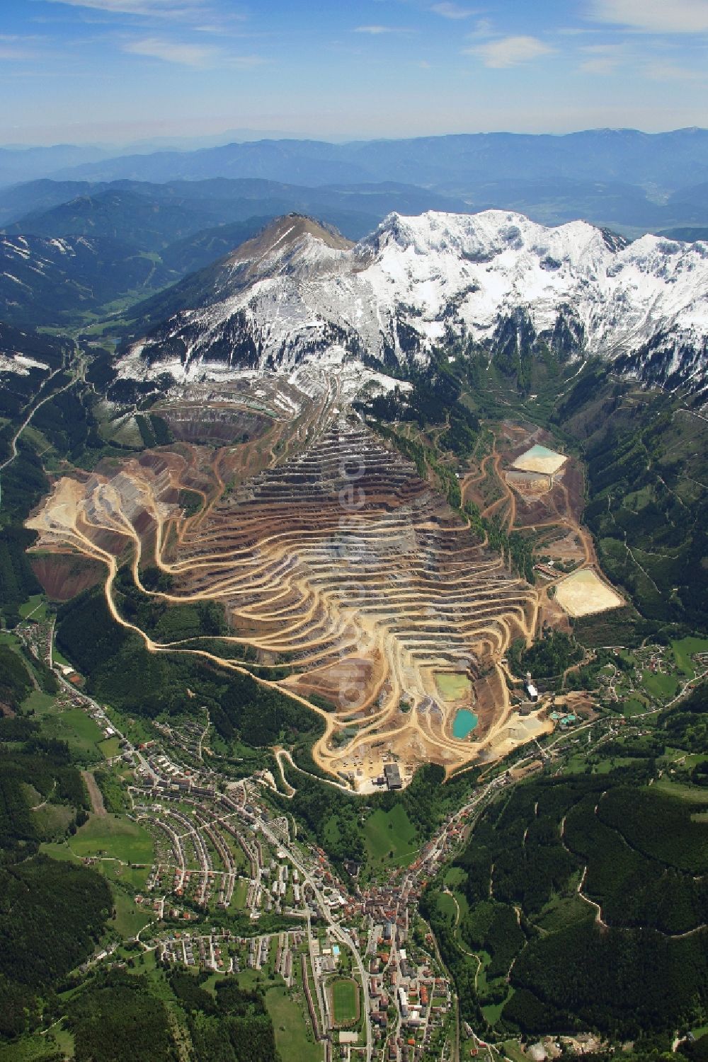 Aerial photograph Eisenerz - Factory of the iron-ore mine and mine iron ore in Styria in Austria. The mine operated by voestalpine AG