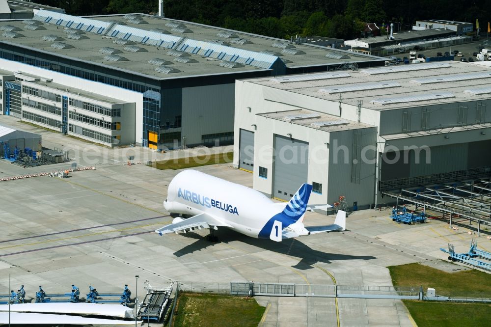 Bremen from above - Building and production halls on the premises of Airbus along the Airbus-Allee in the district Neustadt in Bremen, Germany. In the foreground a transport plane of the Tyues Beluga with the identification F-GSTA - factory number 1