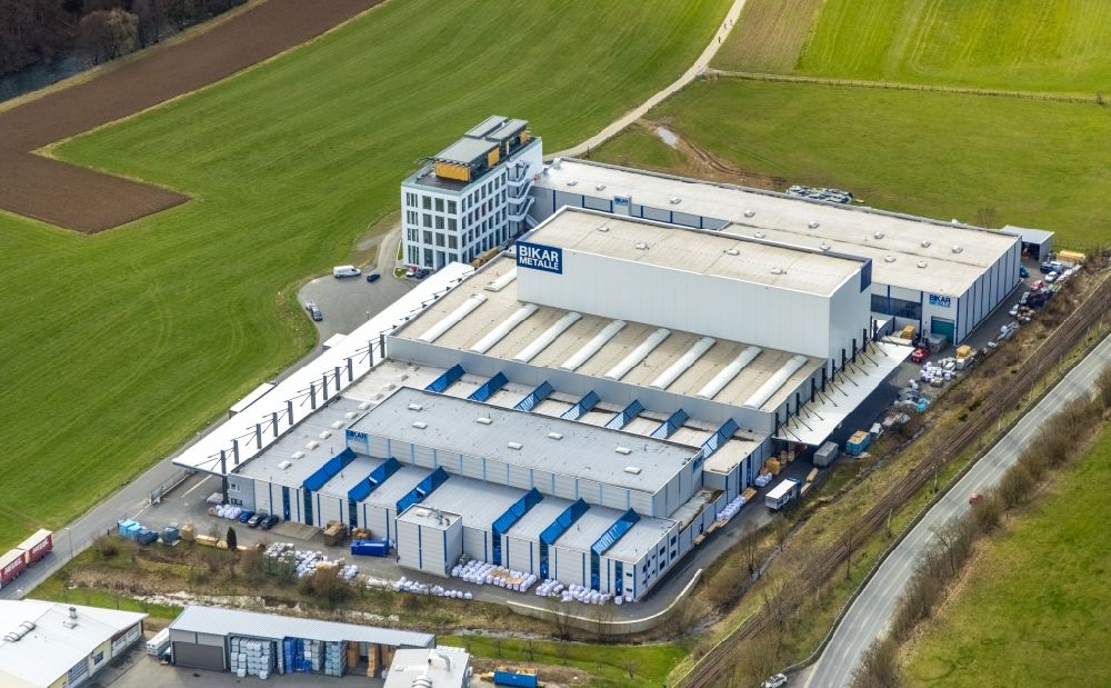 Bad Berleburg from the bird's eye view: Building and production halls on the premises der BIKAR-METALLE GmbH on Industriestrasse in the district Am Stoeppelsweg in Bad Berleburg in the state North Rhine-Westphalia, Germany