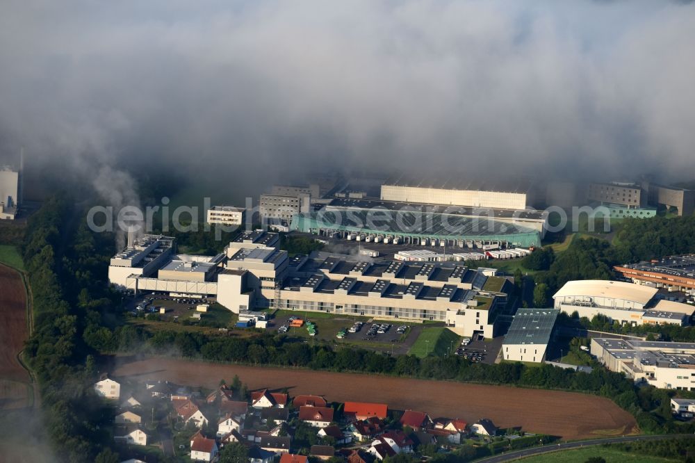 Aerial photograph Melsungen - Building and production halls on the premises of B. Braun Melsungen AG, factory Pfieffewiesen in the district Adelshausen in Melsungen in the state Hesse, Germany