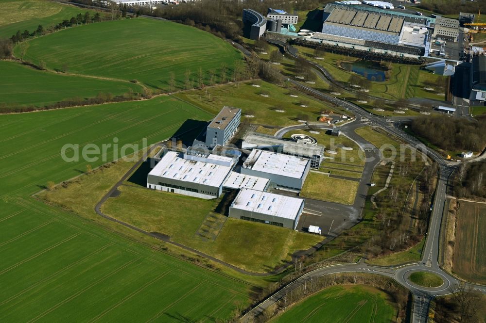 Aerial image Melsungen - Building and production halls on the premises of B. Braun Melsungen AG, factory Pfieffewiesen in the district Adelshausen in Melsungen in the state Hesse, Germany