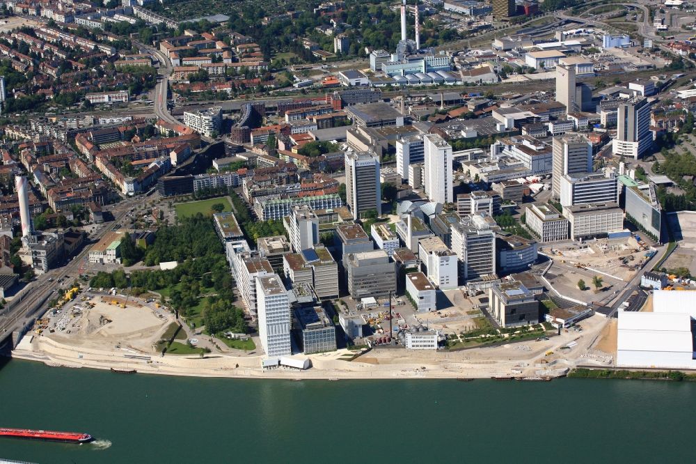 Aerial photograph Basel - Buildings and production halls on the factory premises of pharmaceutical company Novartis in Basel in Switzerland. The Novartis Campus is located in the district of St. Johann and is global headquarter of the pharmaceutical giant with its centre for Research, Development and Management. The buildings are designed by well-known architects