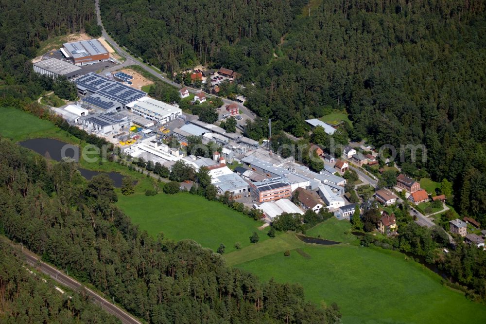 Roth from the bird's eye view: Building and production halls on the premises of the Carl Schlenk AG at the Barnsdorfer Hauptstrasse in the district Barnsdorf in Roth in the state Bavaria, Germany