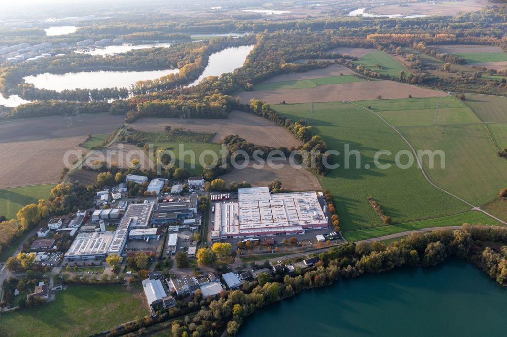 Aerial photograph Neureut - Building and production halls on the premises of Coca-Cola European Partners Deutschland GmbH in Neureut in the state Baden-Wuerttemberg, Germany