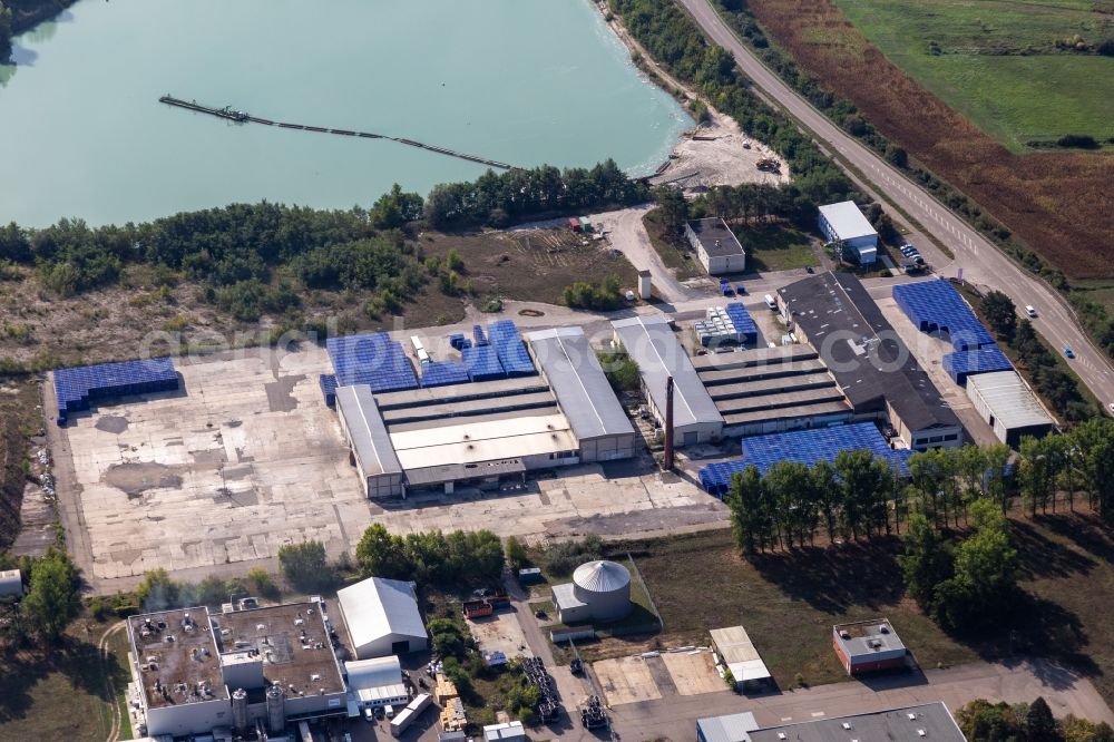Philippsburg from the bird's eye view: Building and production halls on the premises of of Berry Plastics GmbH in Philippsburg in the state Baden-Wuerttemberg, Germany
