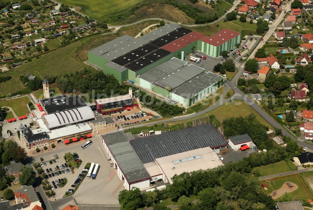 Freyburg (Unstrut) from the bird's eye view: Building and production halls on the premises of of Rotkaeppchen-Mumm Sektkellereien GmbH on Sektkellereistrasse in Freyburg (Unstrut) in the state Saxony-Anhalt, Germany