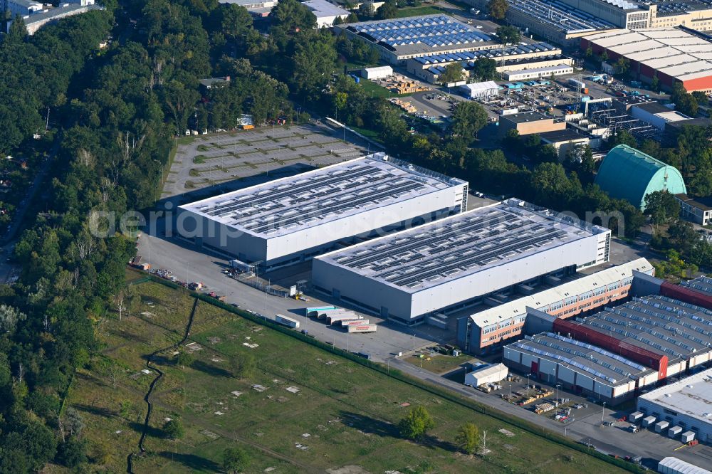 Berlin from above - Building and production halls on the premises of Siemens Energy Schaltwerk Hochspannung (Switchgear Factory) on street Paulsternstrasse in the district Siemensstadt in Berlin, Germany