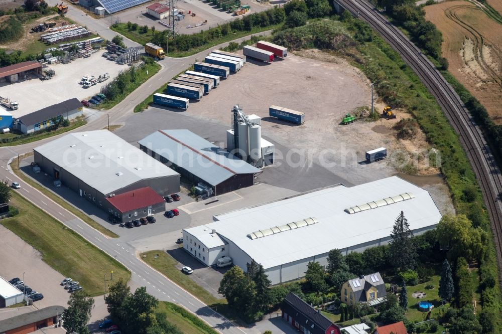 Maxhütte-Haidhof from the bird's eye view: Building and production halls on the premises MK Dienstleistungs GmbH & Co. KG along Obagstrasse in Maxhuette-Haidhof in the state Bavaria, Germany