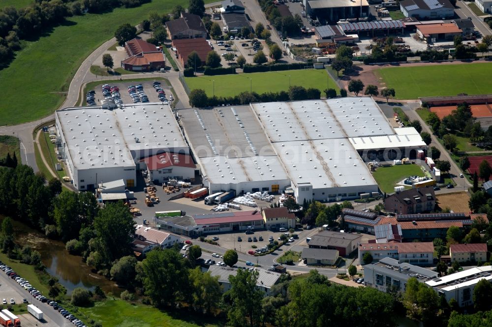 Krautheim from above - Building and production halls on the premises of the Dometic Germany GmbH at the Hollefeldstrasse in Krautheim in the state Baden-Wurttemberg, Germany
